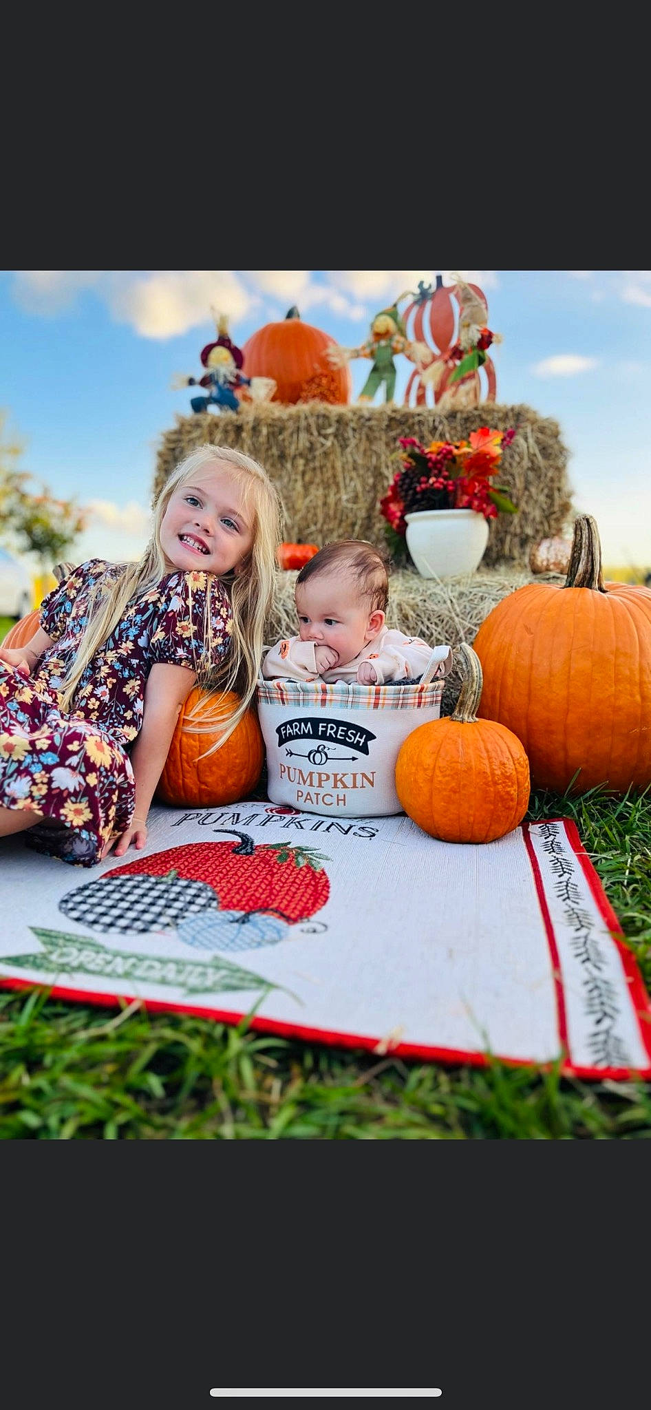 Alyvia joined the competition — help win amazing prizes! calabaza, cucurbita, dress, facial_expression, gourd, grass, happy, joy, leisure, local_food, natural_foods, nature, orange, person, plant, pumpkin, sky, squash, toddler, vegetable