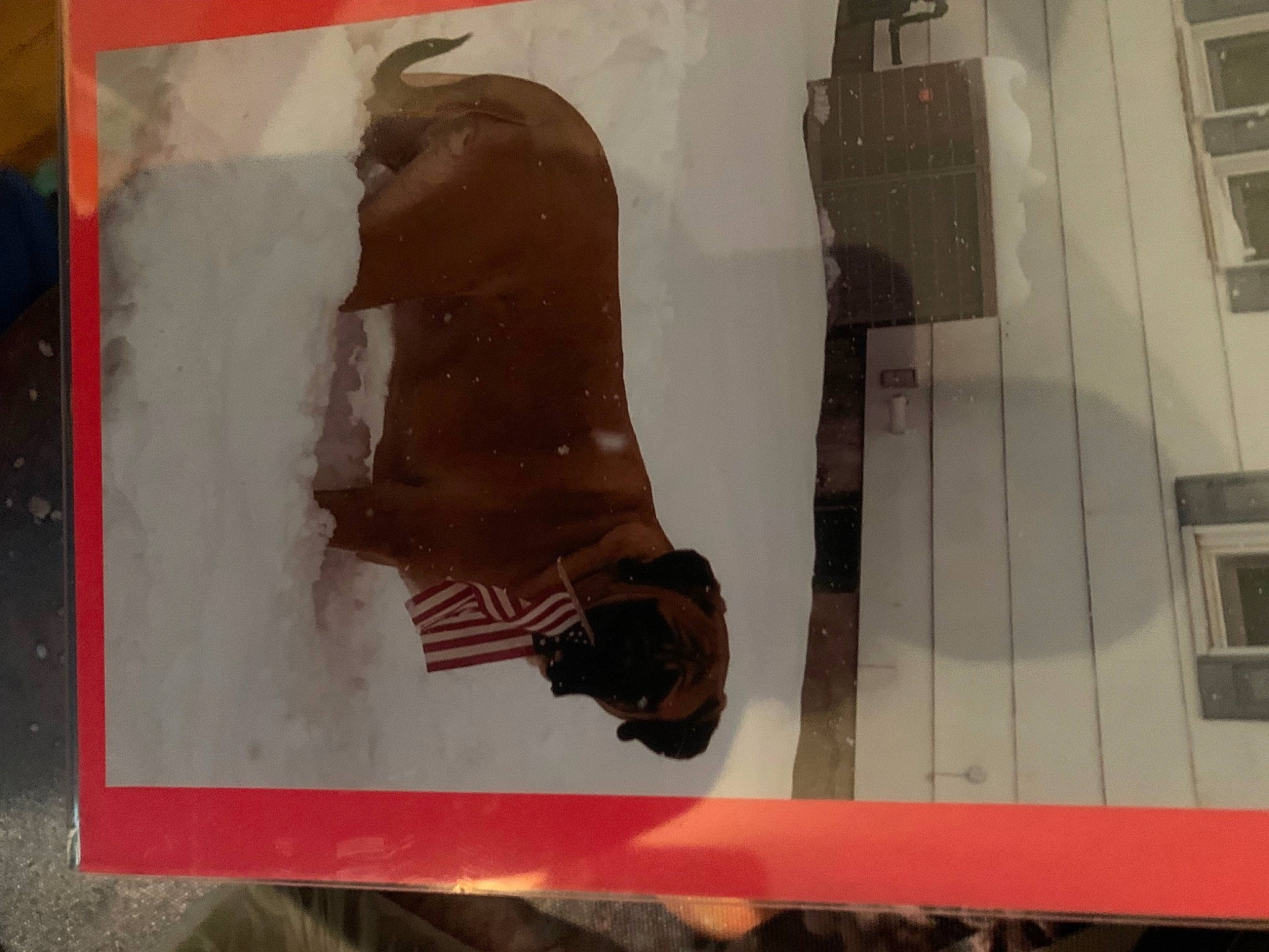 Porter is registered to the contest to win money with this photo: art, brown, building, carmine, font, paper, paper_product, rectangle, room, shadow, tints_and_shades, visual_arts, window, wood