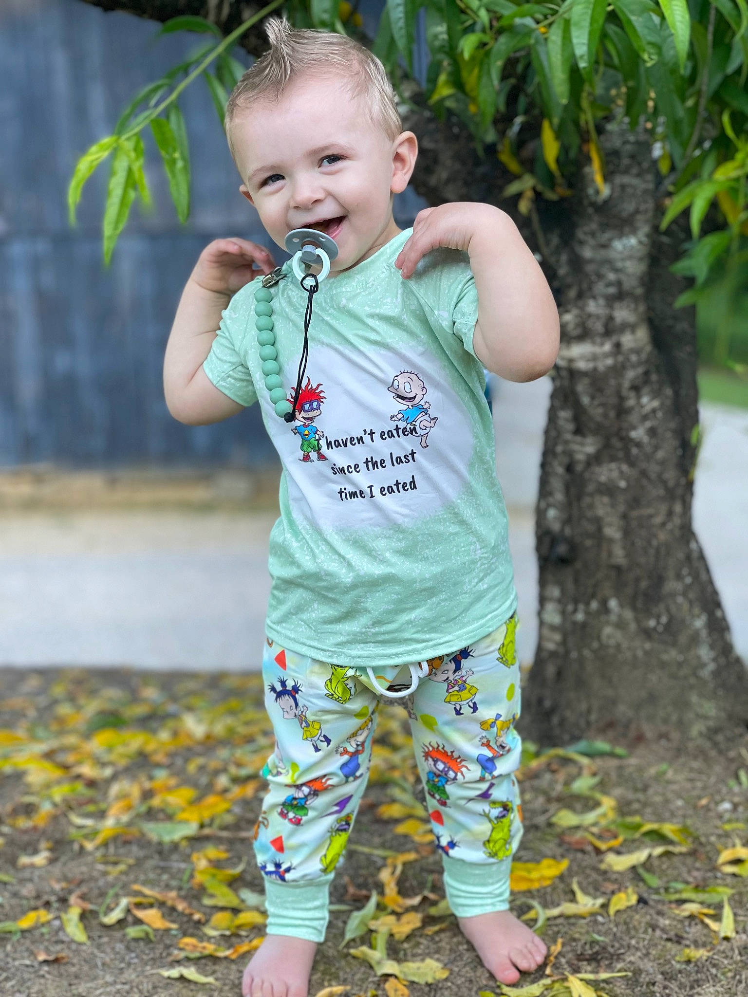 Clayton joined the competition — help win amazing prizes! baby_toddler_clothing, board_short, face, grass, green, hand, happy, head, human_body, joy, leisure, natural_environment, people_in_nature, person, plant, sleeve, smile, street_fashion, t_shirt, toddler