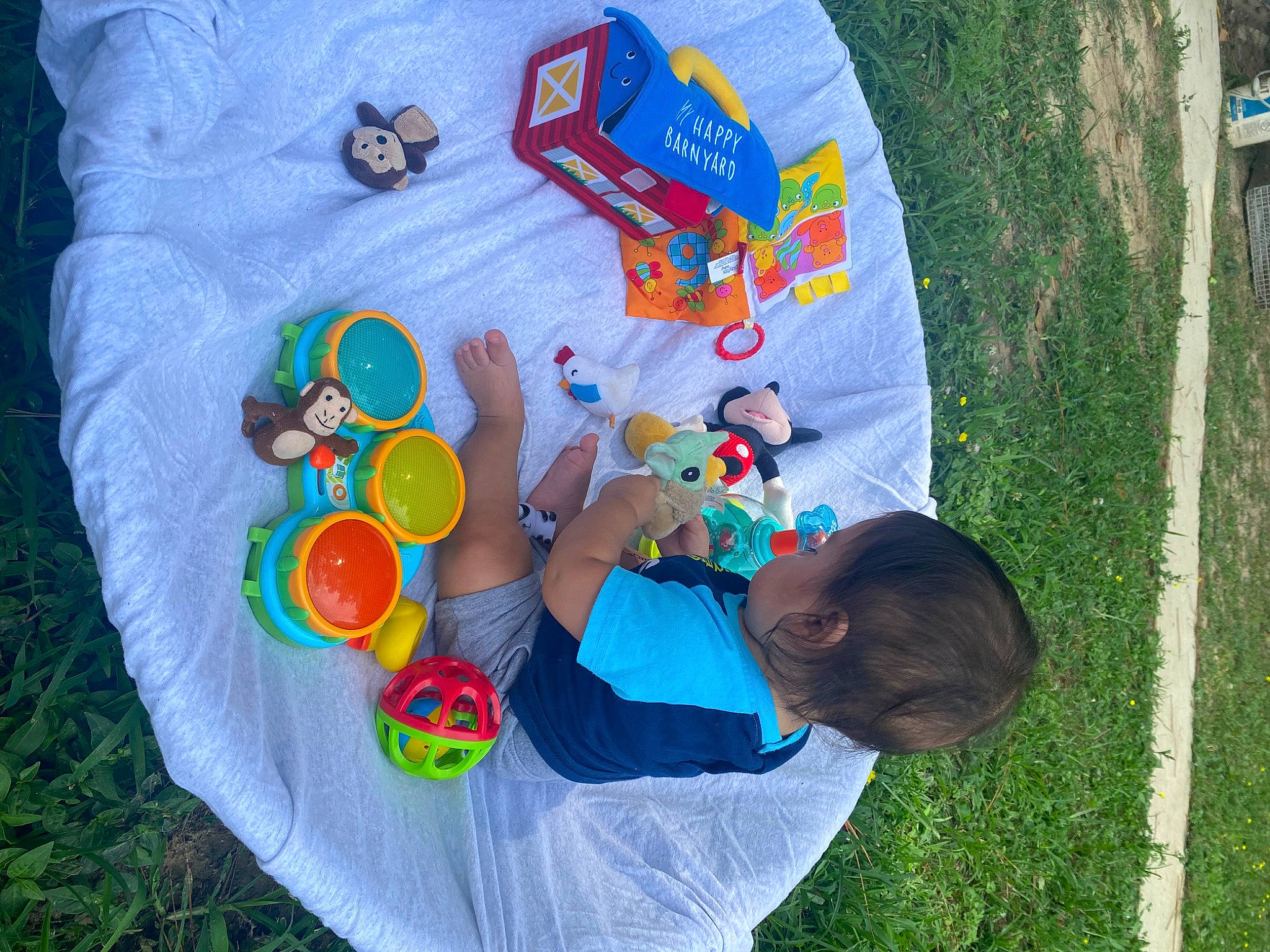 Mario Ezequiel is registered to the contest to win money with this photo: adaptation, art, child, community, design, font, fun, grass, grassland, leisure, person, play, product, recreation, sharing, sitting, t_shirt, toddler, vacation, visual_arts