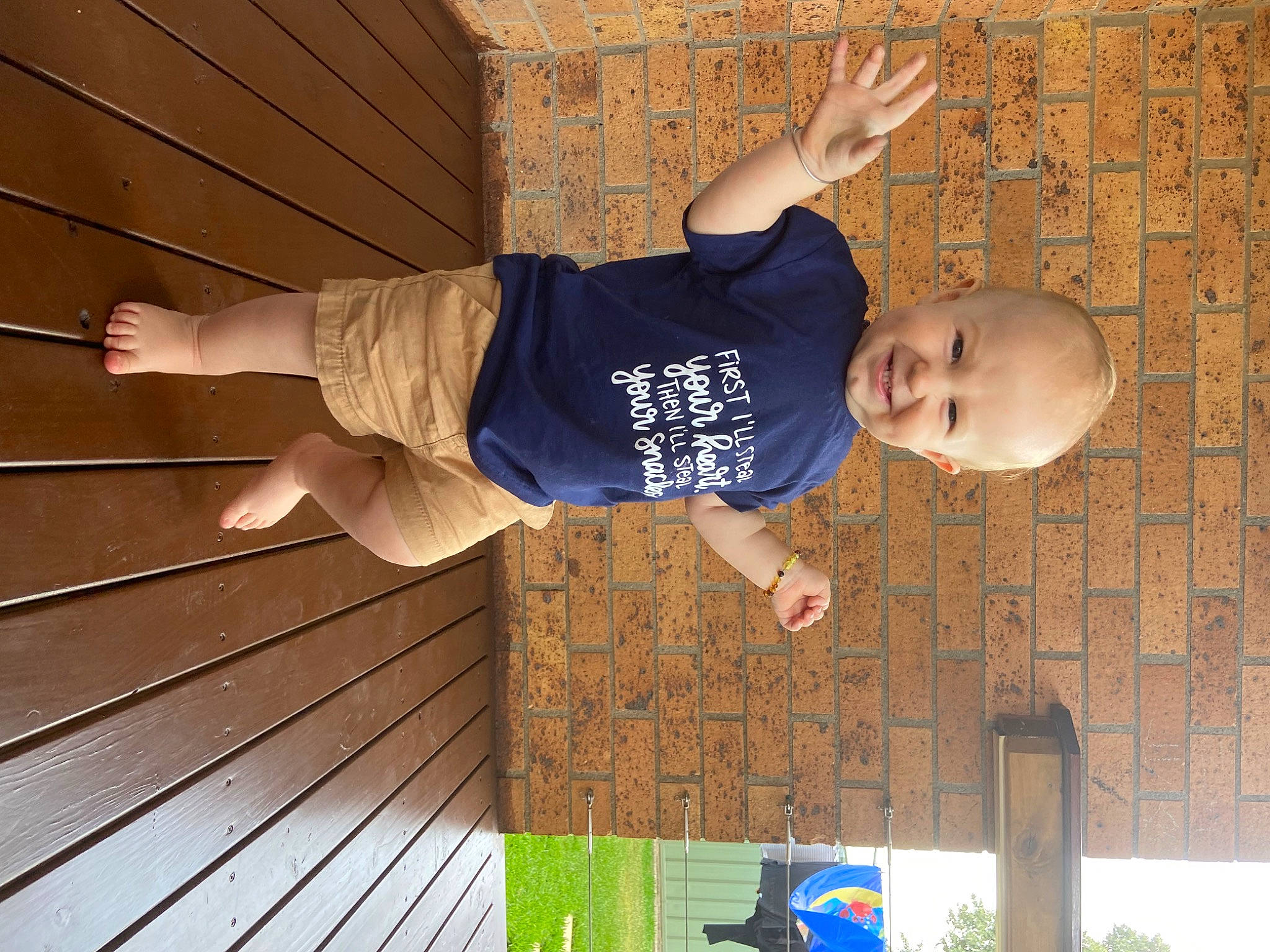 Ollie joined the competition — help win amazing prizes! baby, balance, ceiling, child, elbow, flooring, fun, green, happy, hardwood, human_leg, leisure, pattern, person, play, standing, t_shirt, toddler, wood, wood_stain