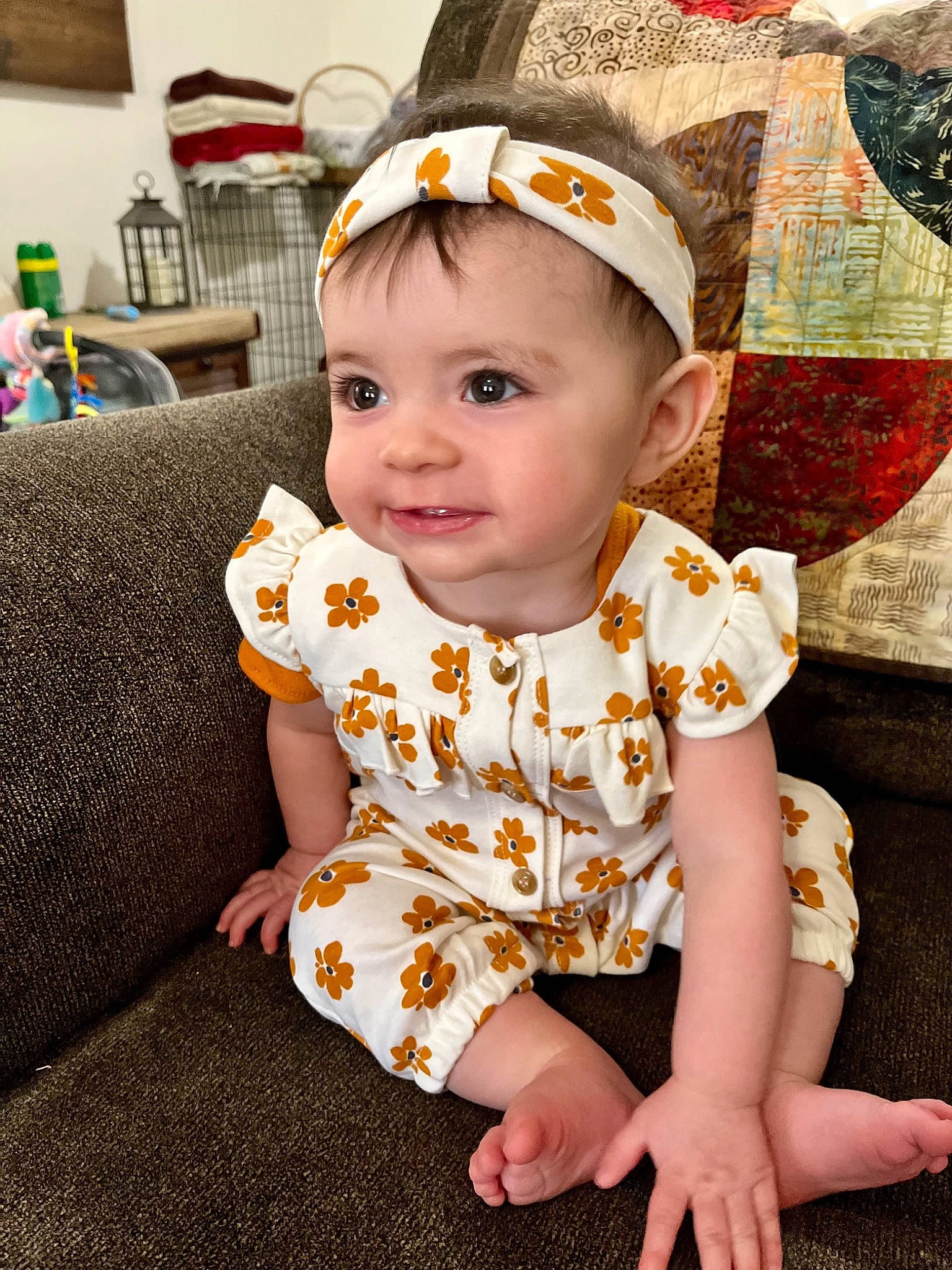 Jody joined the competition — help win amazing prizes! baby, baby_toddler_clothing, cap, cheek, dress, eye, face, facial_expression, fun, grass, happy, head, human_body, mammal, pattern, person, skin, sleeve, standing, t_shirt