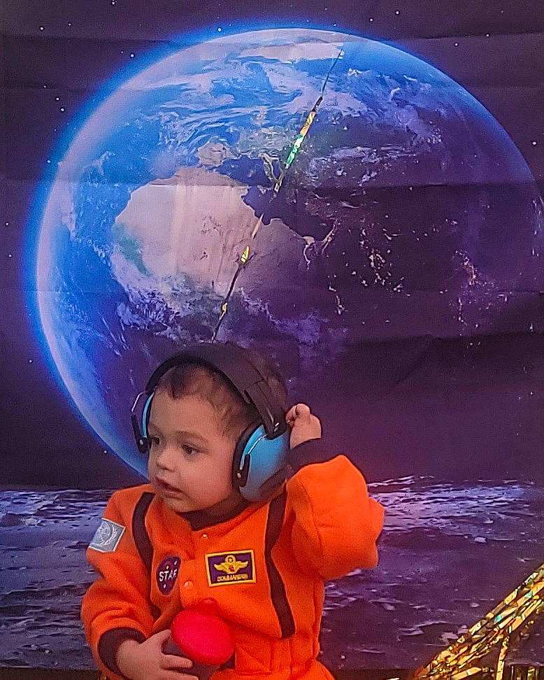 Archer joined the competition — help win amazing prizes! art, astronaut, astronomical_object, astronomy, beauty, electric_blue, event, flash_photography, fun, happy, light, nature, outer_space, people_in_nature, person, planet, science, space, toddler, water