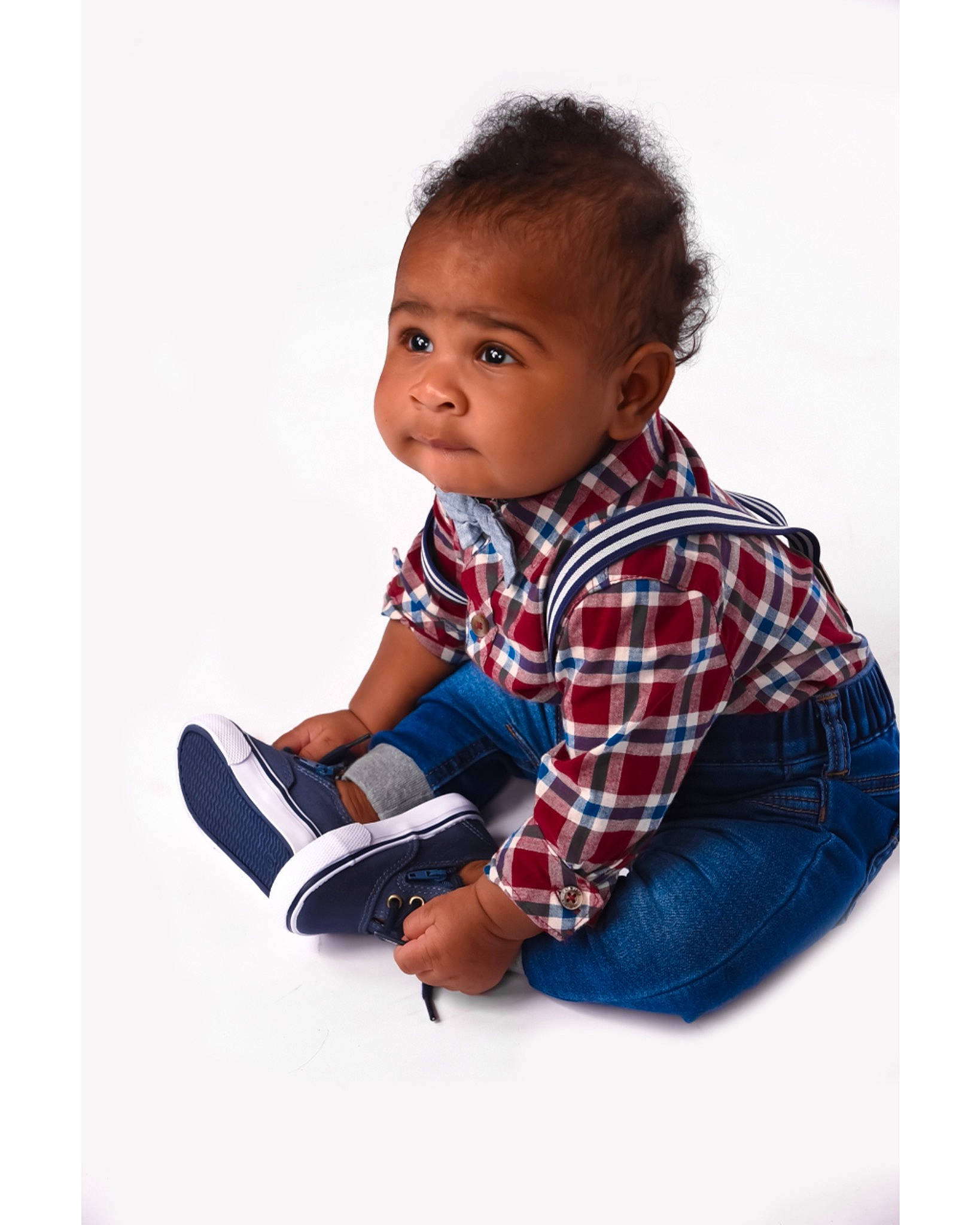 Kyrin is registered to the contest to win money with this photo: baby, baby_products, child, child_model, design, footwear, learning, pattern, person, photography, plaid, play, product, shoe, sitting, standing, stock_photography, tartan, toddler, white