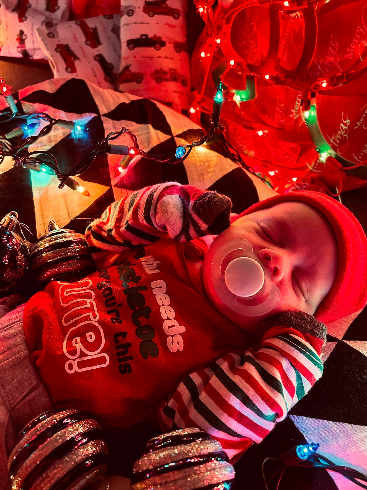 Maddox joined the competition — help win amazing prizes! beverage_can, carmine, christmas_ornament, event, fashion_accessory, font, hat, helmet, holiday, light, magenta, material_property, ornament, party_supply, pattern, person, personal_protective_equipment, pink, product, red