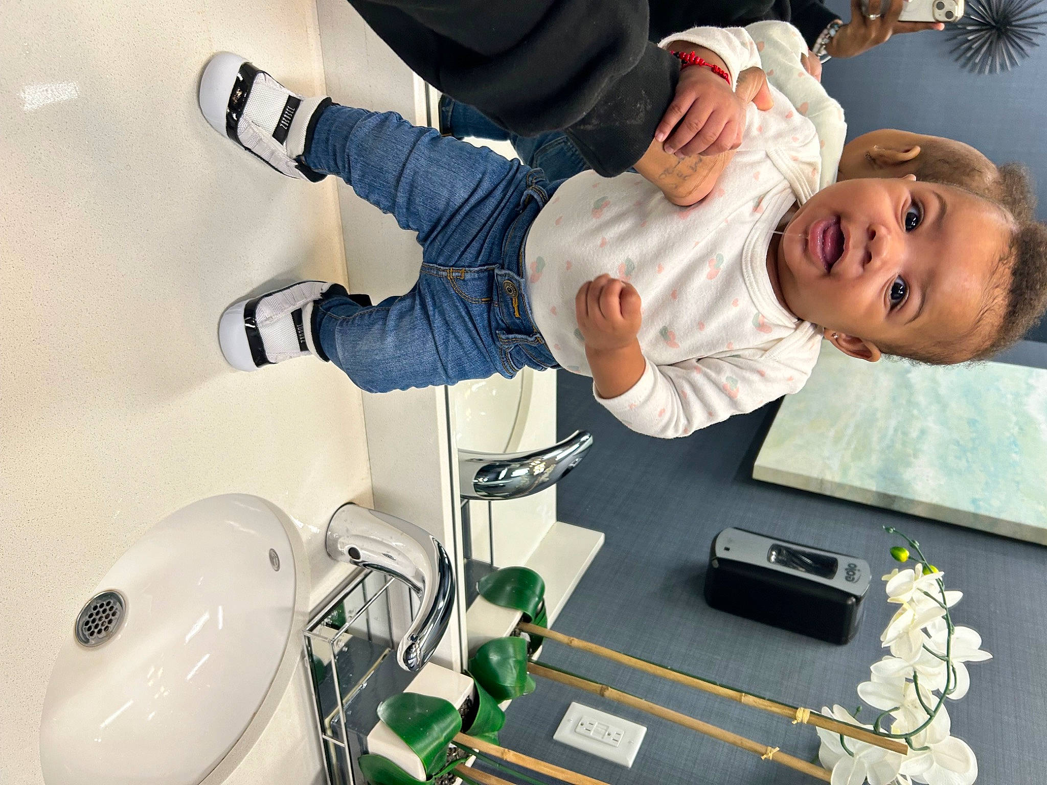 Kailani joined the competition — help win amazing prizes! arm, baby, baby_toddler_clothing, engineering, fun, happy, machine, person, personal_protective_equipment, play, room, smile, sports_gear, sportswear, toddler, uniform