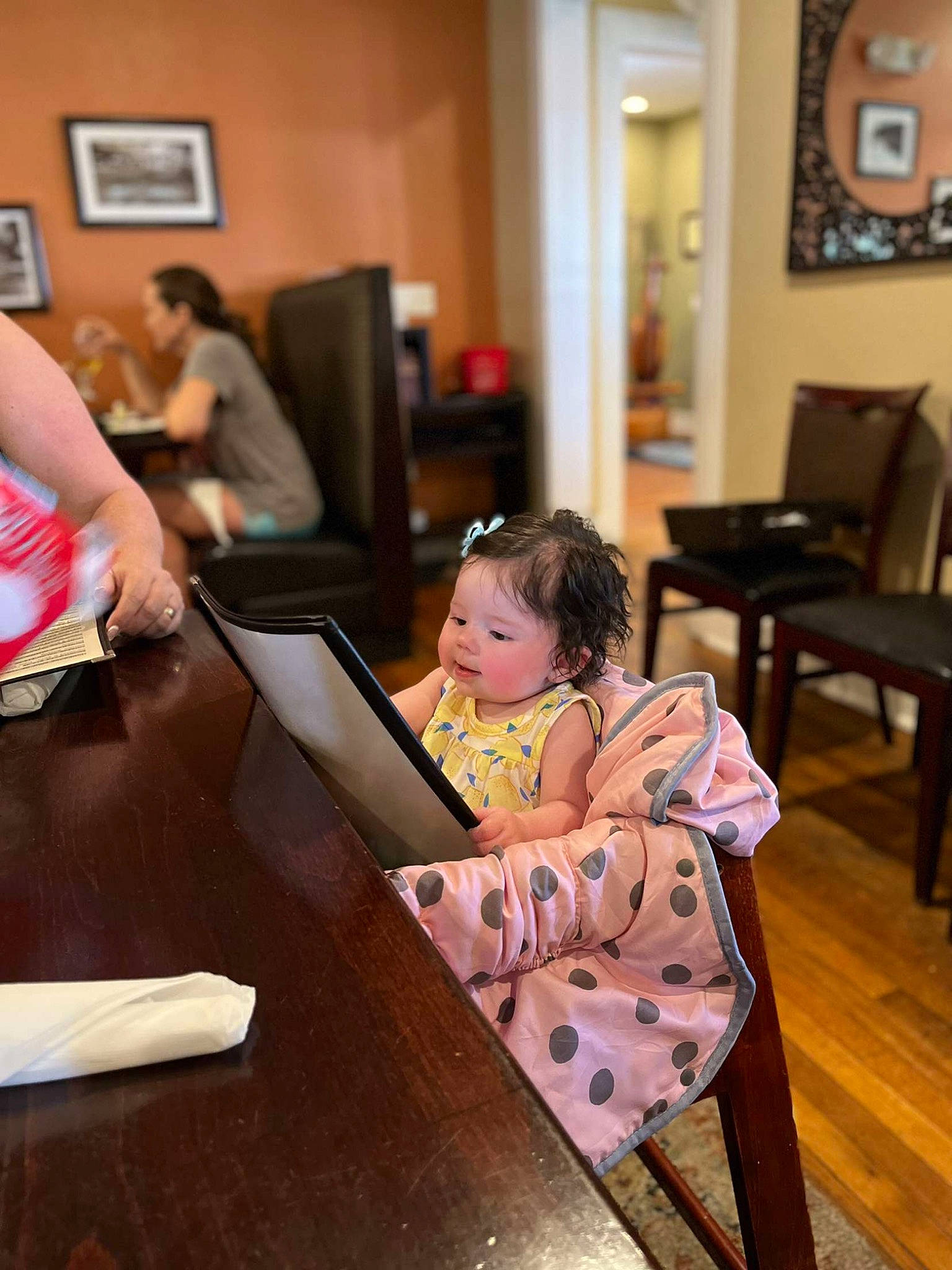 Kassidy joined the competition — help win amazing prizes! chair, child, comfort, event, floor, flooring, fun, furniture, happy, hardwood, interior_design, leisure, living_room, person, picture_frame, room, sitting, t_shirt, table, toddler