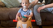 Easton joined the competition — help win amazing prizes! architecture, baby, building, clothing, couch, cushion, face, furniture, head, homedecor, hosiery, indoors, interiordesign, livingroom, person, photography, portrait, room, sitting, sock