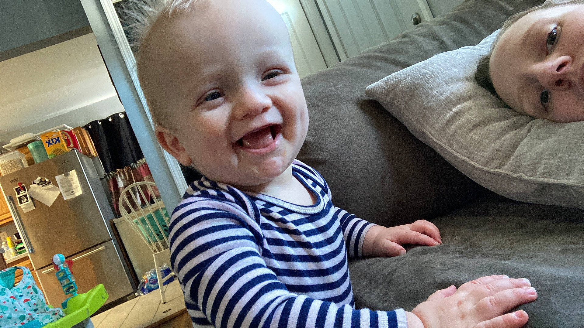 Dekland is registered to the contest to win money with this photo: arm, baby_toddler_clothing, cheek, chin, ear, face, facial_expression, finger, gesture, hairstyle, happy, head, iris, mouth, nose, organ, person, product, skin, smile