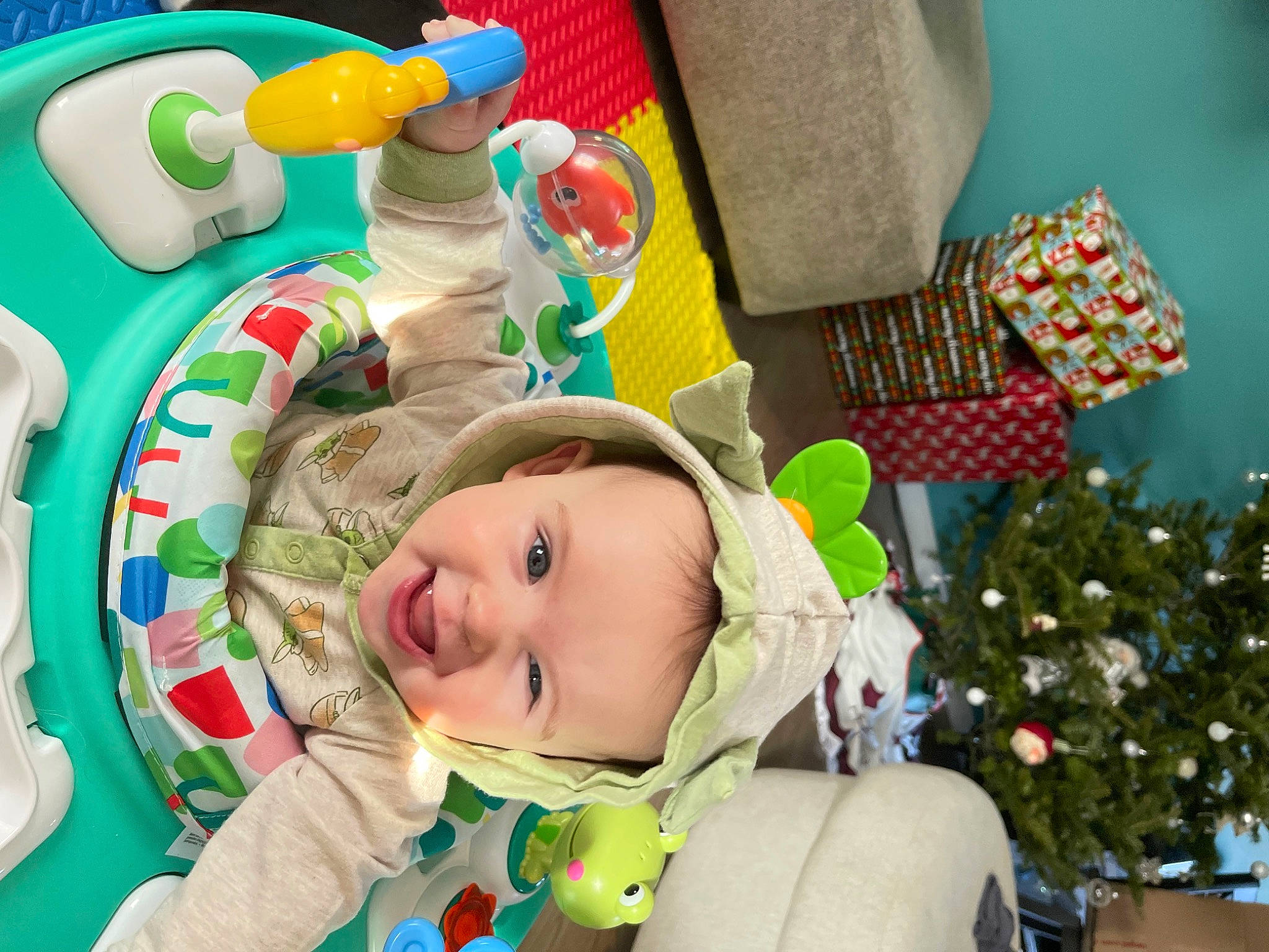 Juliana joined the competition — help win amazing prizes! baby, baby_products, baby_toddler_clothing, baby_toys, child, christmas_tree, event, eye, fun, green, happy, headwear, holiday, leisure, person, room, smile, snapshot, toddler, toy