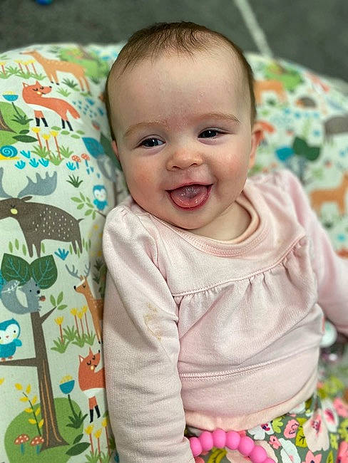 Juliana joined the competition — help win amazing prizes! baby, baby_toddler_clothing, cheek, child, dress, eye, fun, grass, happy, head, iris, pattern, person, pink, skin, sleeve, smile, t_shirt, textile, toddler