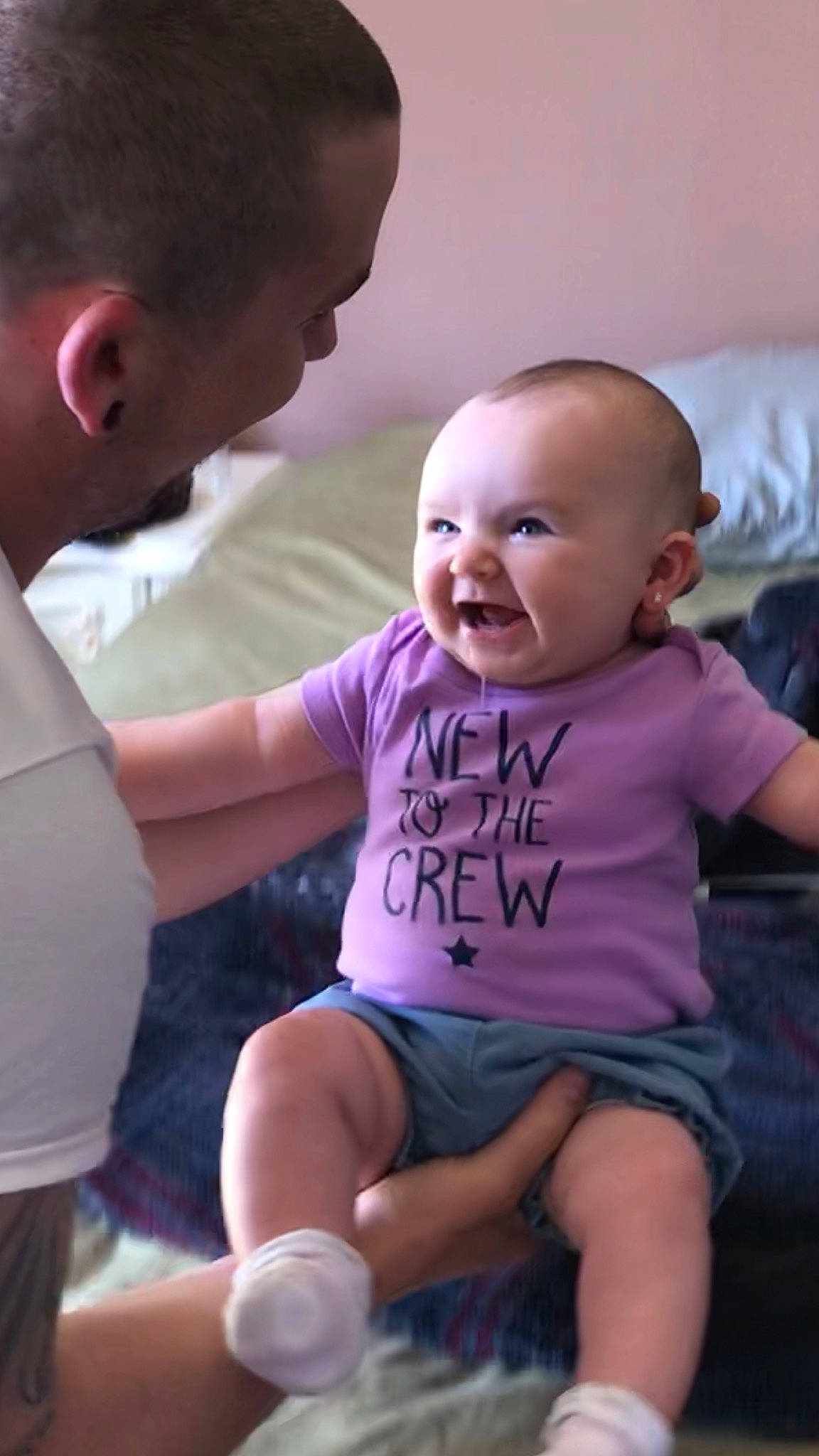 Eleanora is registered to the contest to win money with this photo: arm, baby, cheek, child, daughter, ear, facial_expression, family, father, happy, people, person, sitting, skin, smile, toddler, vacation