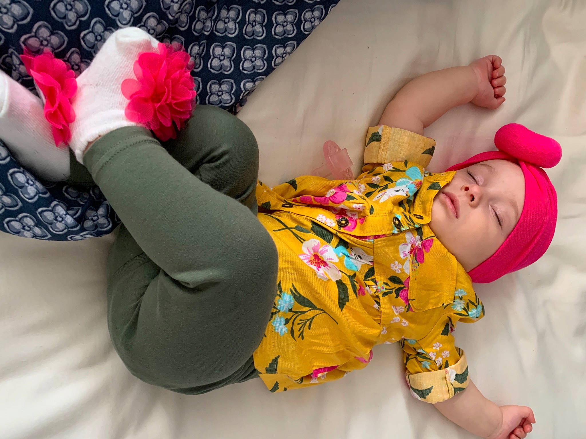 Layla Lujane is registered to the contest to win money with this photo: arm, baby, child, foot, footwear, headwear, leg, person, pink, plush, product, room, shoe, sleeve, stuffed_toy, textile, toddler, toy, yellow