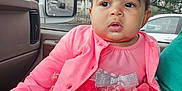 Tiani joined the competition — help win amazing prizes! baby, car_interior, car_mirror, car_window, child, curious, cute, drool, flower, headband, indoor, jacket, person, pink_clothing, portrait, seat, seatbelt, tights, trees, vehicle