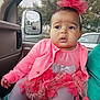 baby, car_interior, car_mirror, car_window, child, curious, cute, drool, flower, headband, indoor, jacket, person, pink_clothing, portrait, seat, seatbelt, tights, trees, vehicle