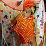 Tiani joined the competition — help win amazing prizes! baby, baby_chair, child, colorful, curious, cute, expression, flower, footwear, headband, indoors, infant, mickey_mouse, minnie_mouse, orange_dress, pattern, polka_dot, seated, socks, soft_toys