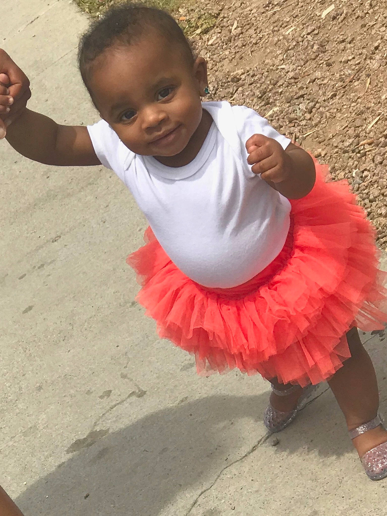 Khamari is registered to the contest to win money with this photo: ballet_tutu, child, costume, dress, footwear, fun, happy, person, pink, play, shoe, smile, toddler
