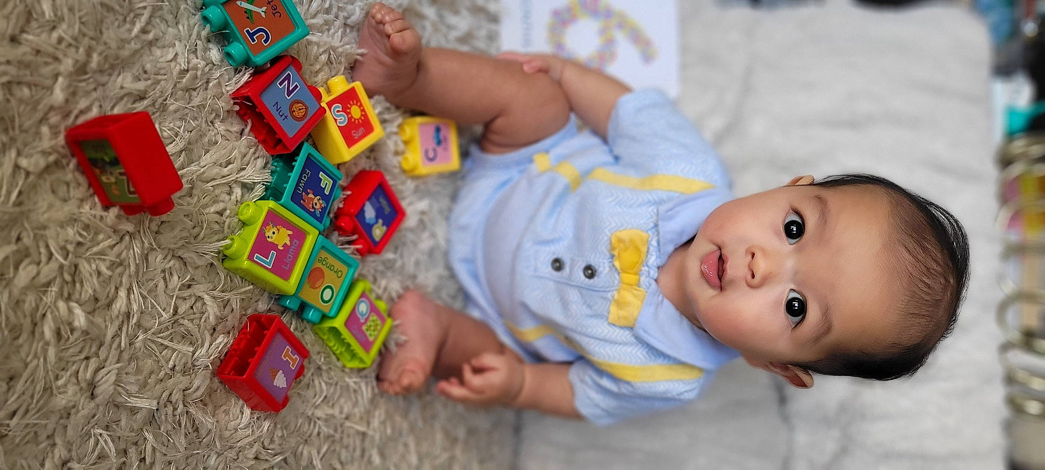 Camden joined the competition — help win amazing prizes! baby, baby_toddler_clothing, baby_toys, child, educational_toy, fun, hand, happy, indoor_games_and_sports, person, plastic, play, product, recreation, room, sharing, toddler, toy