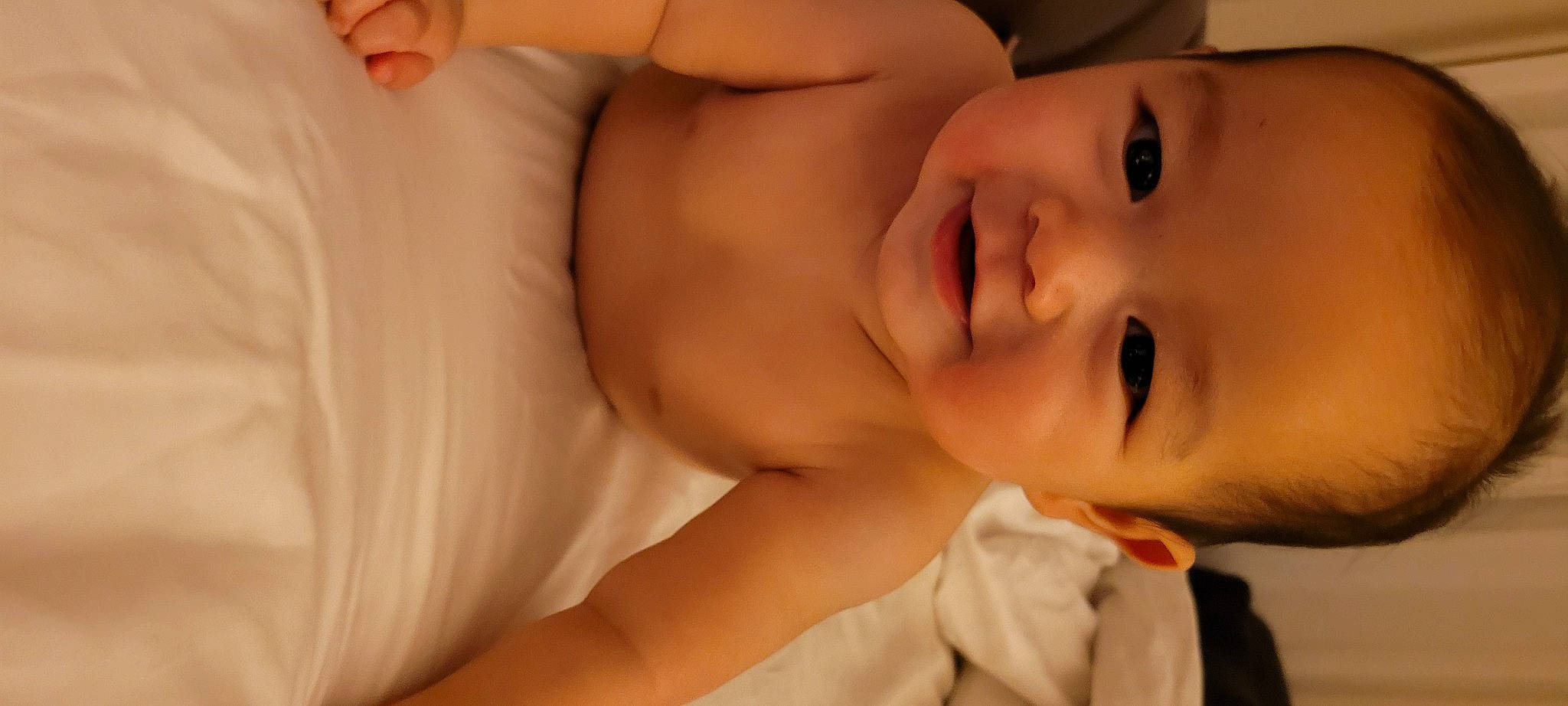 Camden is registered to the contest to win money with this photo: abdomen, baby, cheek, chest, comfort, eye, eyebrow, eyelash, flash_photography, happy, headgear, human_body, iris, lip, mouth, neck, nose, person, smile, toddler