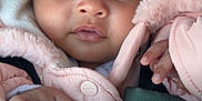Nourhane participe au concours pour gagner de l'argent avec cette photo : adorable, baby, blanket, bundle, child, closeup, clothing, cozy, cute, eyes, face, fluffy, hands, hood, infant, newborn, pink_jacket, portrait, soft, warm
