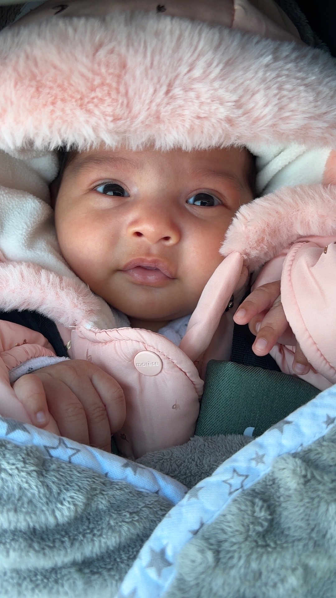 Nourhane participe au concours pour gagner de l'argent avec cette photo : adorable, baby, blanket, bundle, child, closeup, clothing, cozy, cute, eyes, face, fluffy, hands, hood, infant, newborn, pink_jacket, portrait, soft, warm