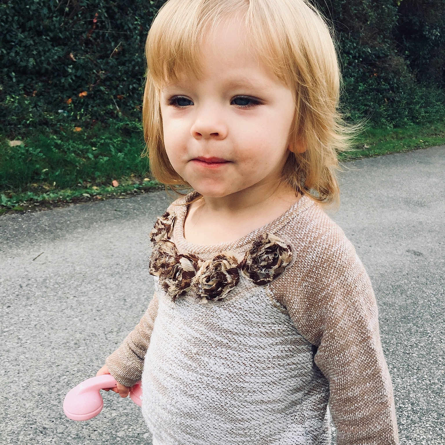 Skylah is registered to the contest to win money with this photo: blond, cheek, child, child_model, eye, fun, girl, hair, hairstyle, human_hair_color, knitting, outerwear, pattern, person, portrait_photography, skin, smile, sweater, toddler
