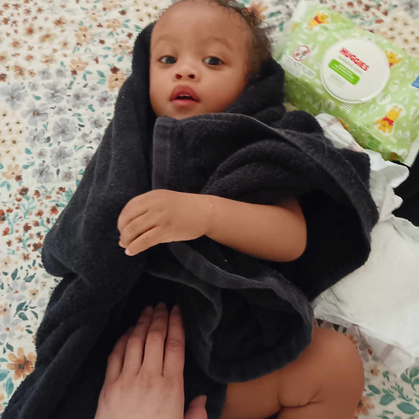 Lincoln is registered to the contest to win money with this photo: applique, baby, blanket, bodypart, clothing, face, fashion, finger, fleece, hand, happy, head, newborn, pattern, person, photography, portrait, quilt, smile, towel