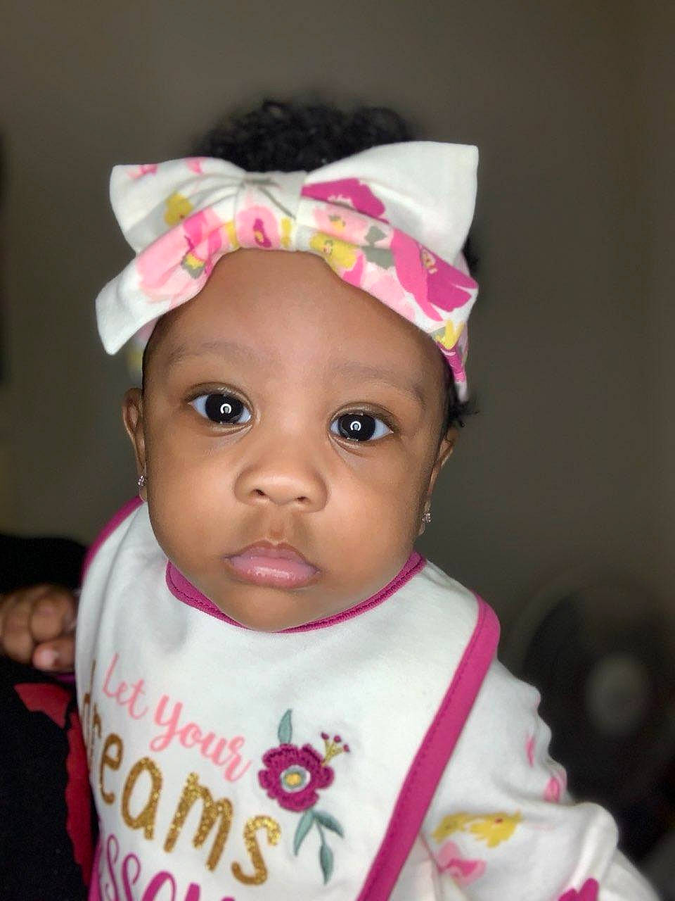 Dessiah is registered to the contest to win money with this photo: baby, baby_toddler_clothing, birthday, cap, cheek, costume_hat, dress, event, eye, eyebrow, eyelash, happy, hat, headgear, headwear, lip, magenta, nose, party_supply, person