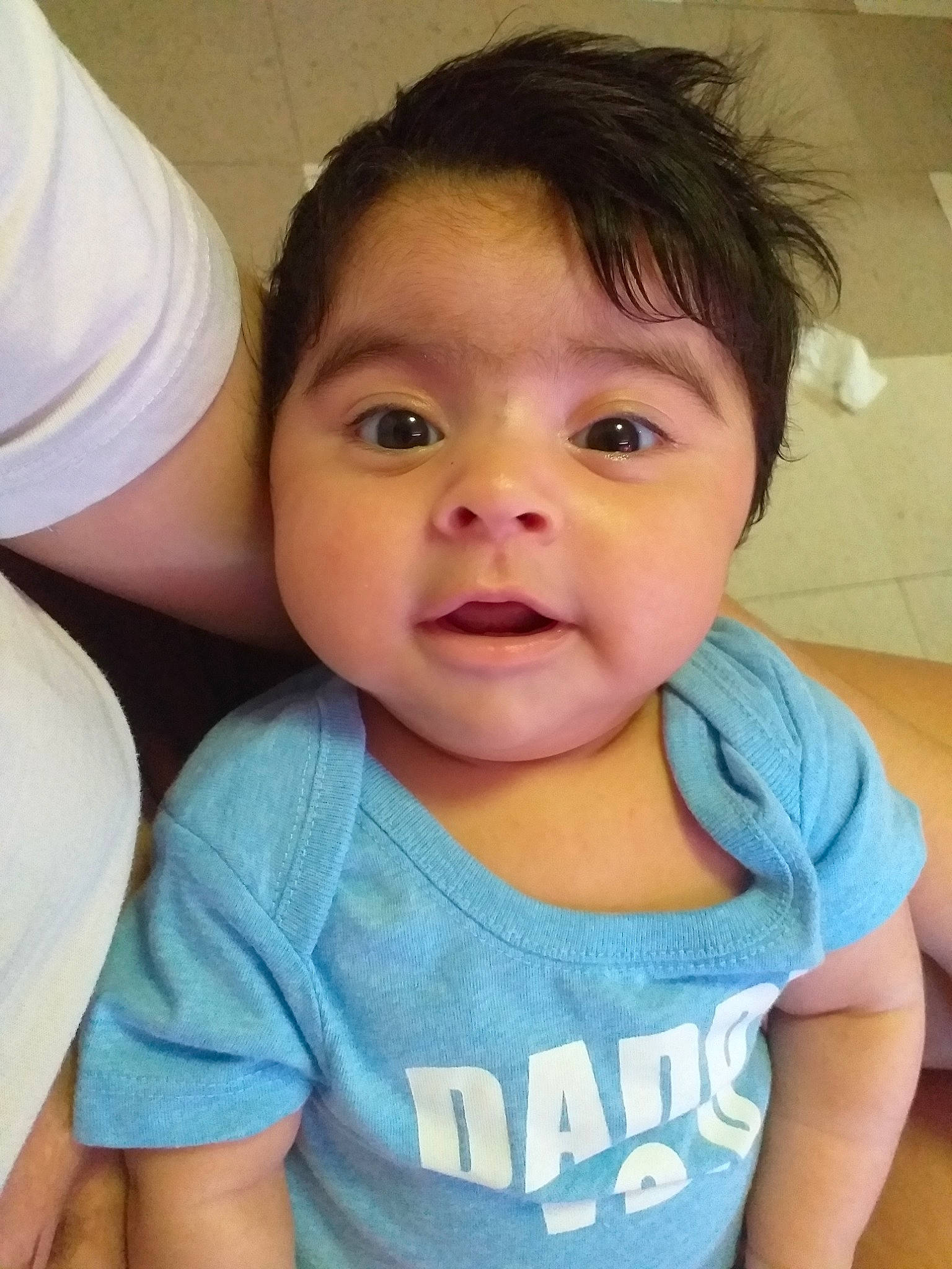 Bishop is registered to the contest to win money with this photo: baby, cheek, child, chin, eye, eyebrow, face, forehead, head, lip, mouth, nose, person, skin, smile, toddler