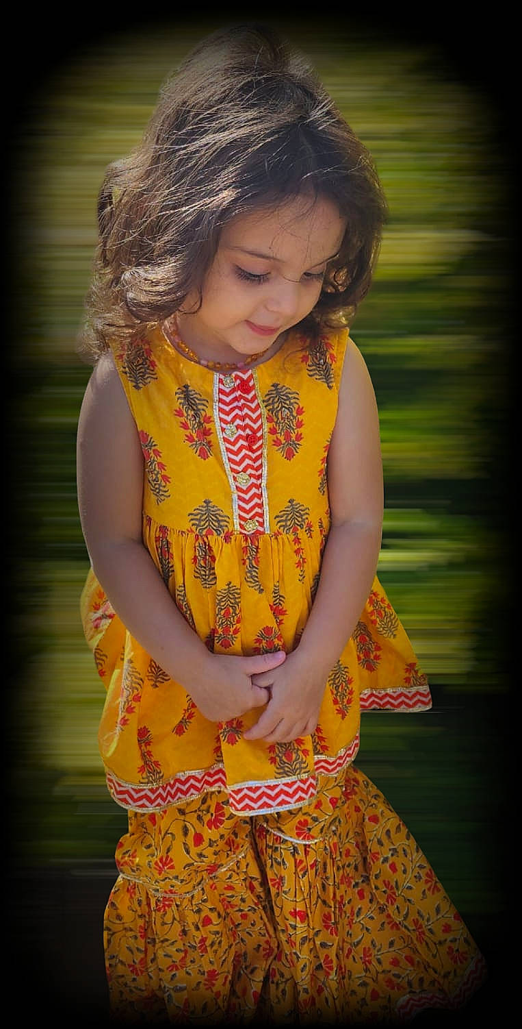 Azaria joined the competition — help win amazing prizes! baby_toddler_clothing, brown_hair, child, day_dress, dress, eye, face, fashion_design, fawn, flash_photography, grass, hair, happy, head, pattern, person, pink, skin, sleeve, toddler