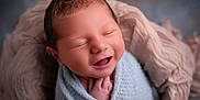 Luca joined the competition — help win amazing prizes! baby, blanket, child, closed_eyes, cozy, cute, face, hands, head, infant, knitted, newborn, peaceful, portrait, skin, sleeping, smiling, soft_texture, warm, wrapped