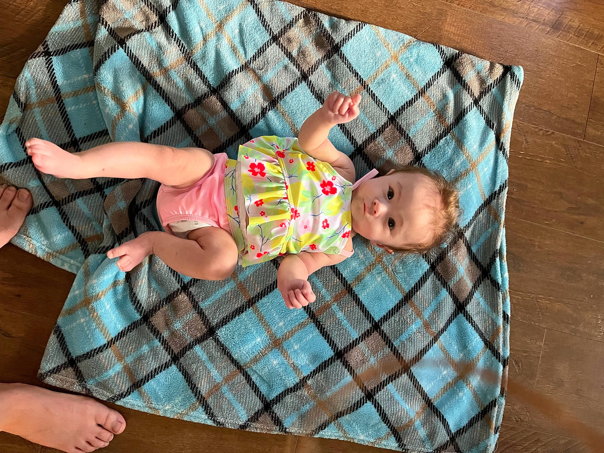 Dyani is registered to the contest to win money with this photo: baby, baby_products, baby_safety, baby_toddler_clothing, child, comfort, cradle, hand, head, human_body, infant_bed, leg, leisure, pattern, person, pink, shorts, thigh, toddler, tree