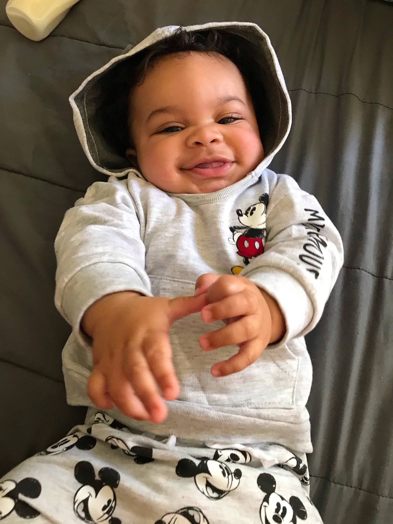 Zamari joined the competition — help win amazing prizes! baby, baby_toddler_clothing, black, cheek, collar, comfort, eye, face, facial_expression, happy, head, organ, outerwear, person, photograph, product, skin, sleeve, smile, textile