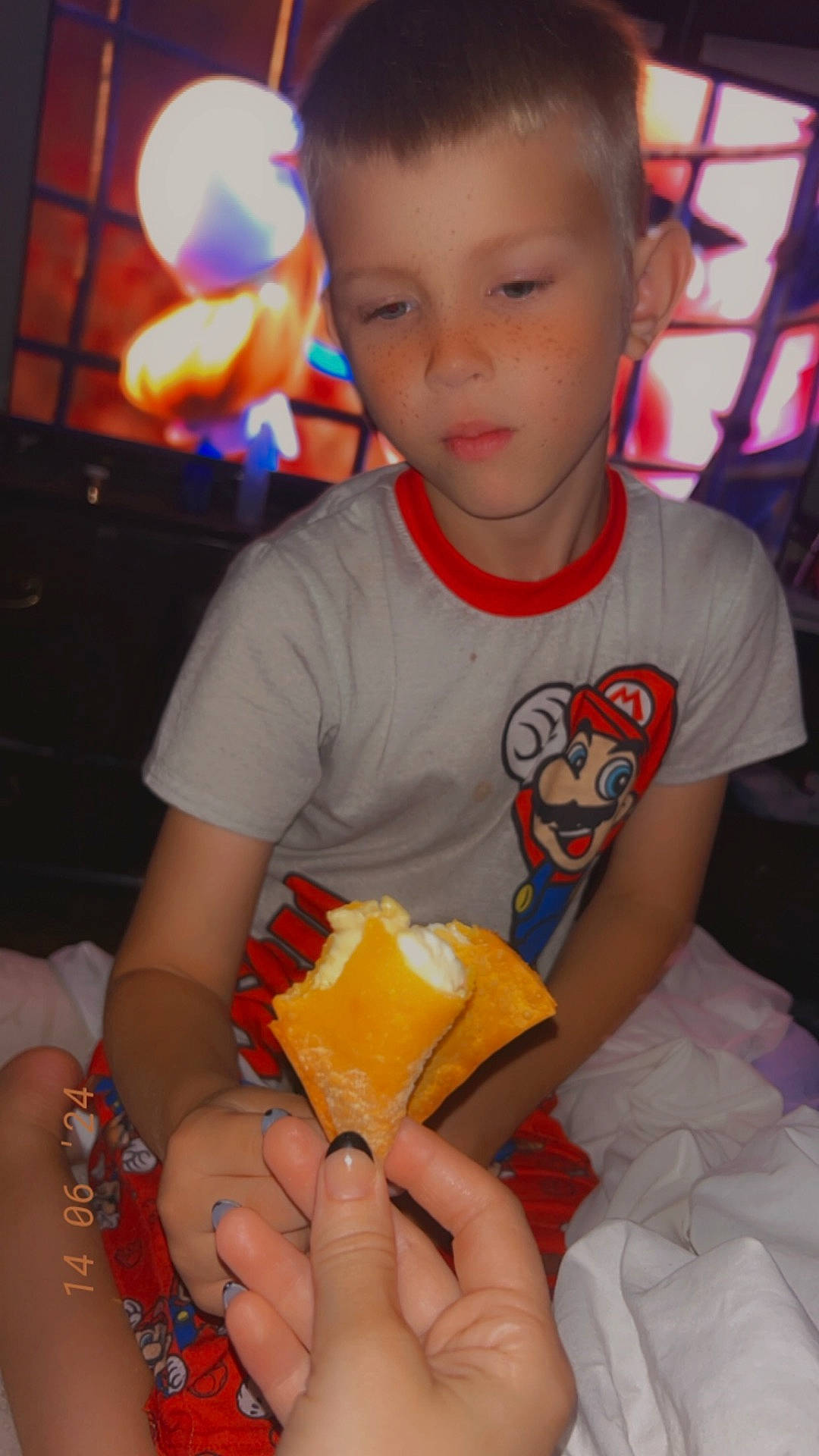 Kaspin is registered to the contest to win money with this photo: bodypart, boy, child, clothing, couch, cream, dessert, face, finger, food, hand, head, icecream, icing, male, person, photography, portrait, sweets, t_shirt