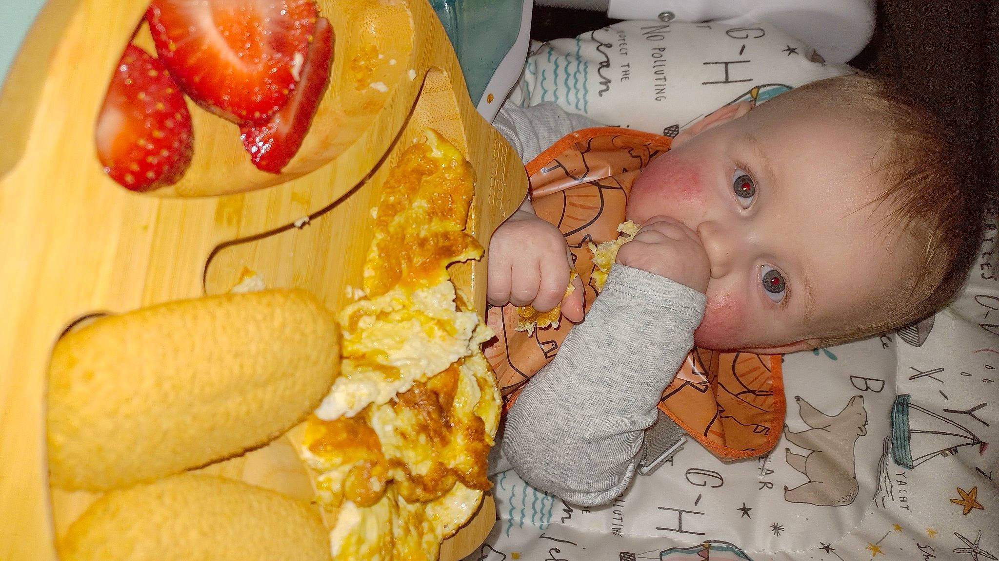 Finley is registered to the contest to win money with this photo: baby, baby_products, baby_toddler_clothing, corn, corn_kernels, corn_on_the_cob, cuisine, dish, food, happy, human_body, ingredient, natural_foods, person, recipe, staple_food, strawberry, sweet_corn, tableware, toddler