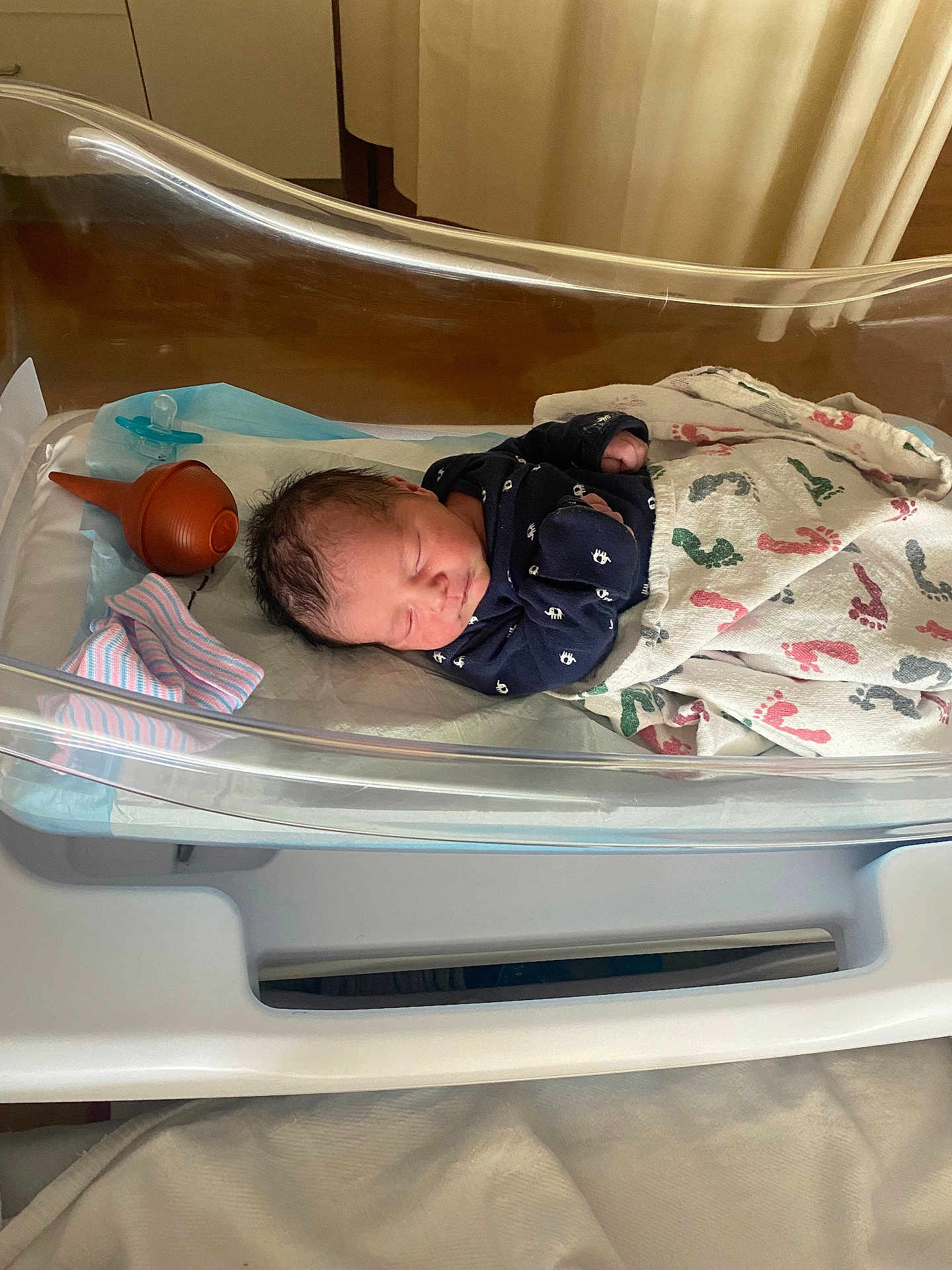 Roy joined the competition — help win amazing prizes! newborn, baby, hospital, bassinet, blanket, sleeping, infant, pacifier, medical, nursery, clothing, cute, person, bed, resting, indoors, healthcare, newborn_care, peaceful, baby_bedding