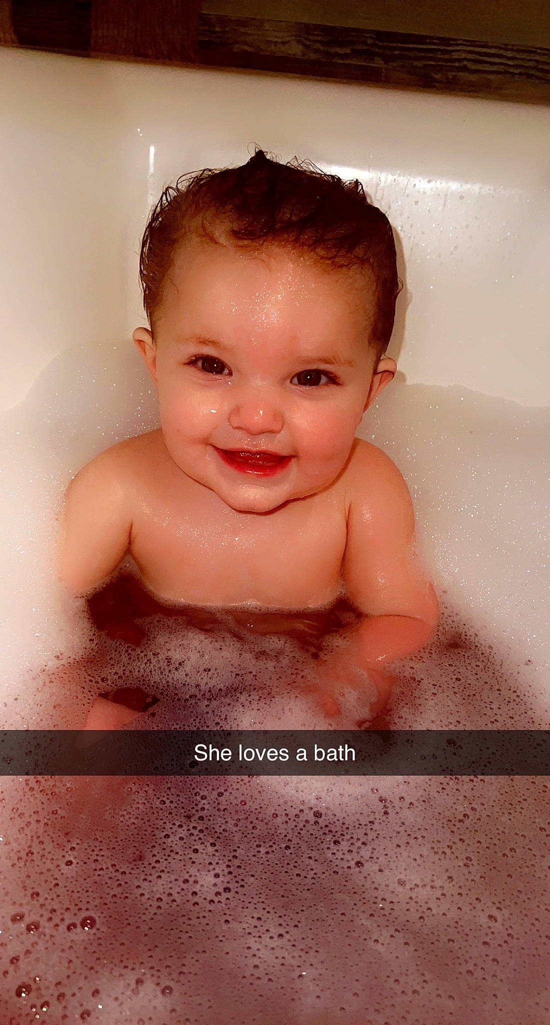 Melissalynn is registered to the contest to win money with this photo: baby_bathing, bathing, bathroom, bathtub, cheek, chest, eye, eyelash, flash_photography, fluid, happy, head, human_body, jaw, joy, nose, person, plumbing_fixture, skin, smile