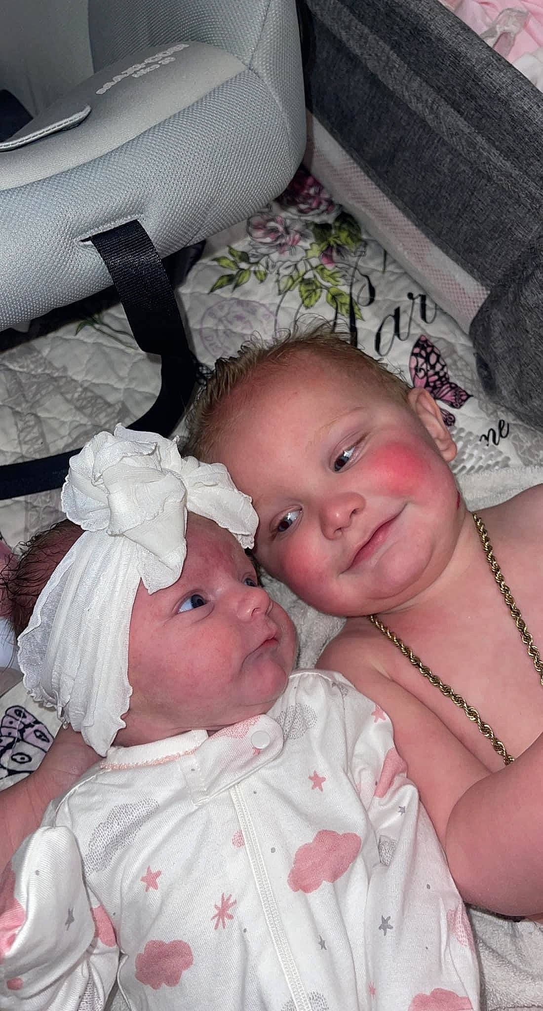 Josiah is registered to the contest to win money with this photo: abdomen, baby, baby_products, baby_toddler_clothing, cheek, chest, child, comfort, event, grass, happy, headwear, iris, jewellery, joy, lip, pattern, person, sitting, skin