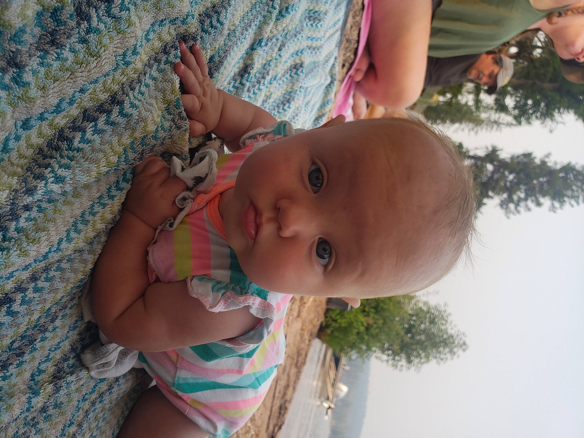 Eleanor Mae is registered to the contest to win money with this photo: abdomen, baby, baby_toddler_clothing, blue, chest, finger, fun, grass, happy, hat, headwear, leisure, lip, mouth, nose, person, plant, skin, smile, toddler