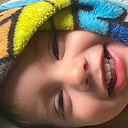 Yuto joined the competition — help win amazing prizes! blanket, child, closeup, colorful, comfort, cozy, expression, eyelashes, face, fuzzy, happy, head, joyful, mouth, nose, portrait, skin, smile, teeth, warm