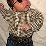 Angel is registered to the contest to win money with this photo: baby, child, cowboy, hat, sunglasses, jeans, belt, boots, plaid_shirt, infant, portrait, fashion, cute, lying_down, western_style, accessories, clothing, indoor, baby_fashion, adorable