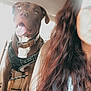 Maïko participe au concours pour gagner de l'argent avec cette photo : backseat, brown_dog, candid, car_interior, casual_clothing, closeup, dog, dog_harness, happy, indoor, leash, light, long_hair, pet, portrait, seat, seatbelt, tongue_out, wavy_hair, woman