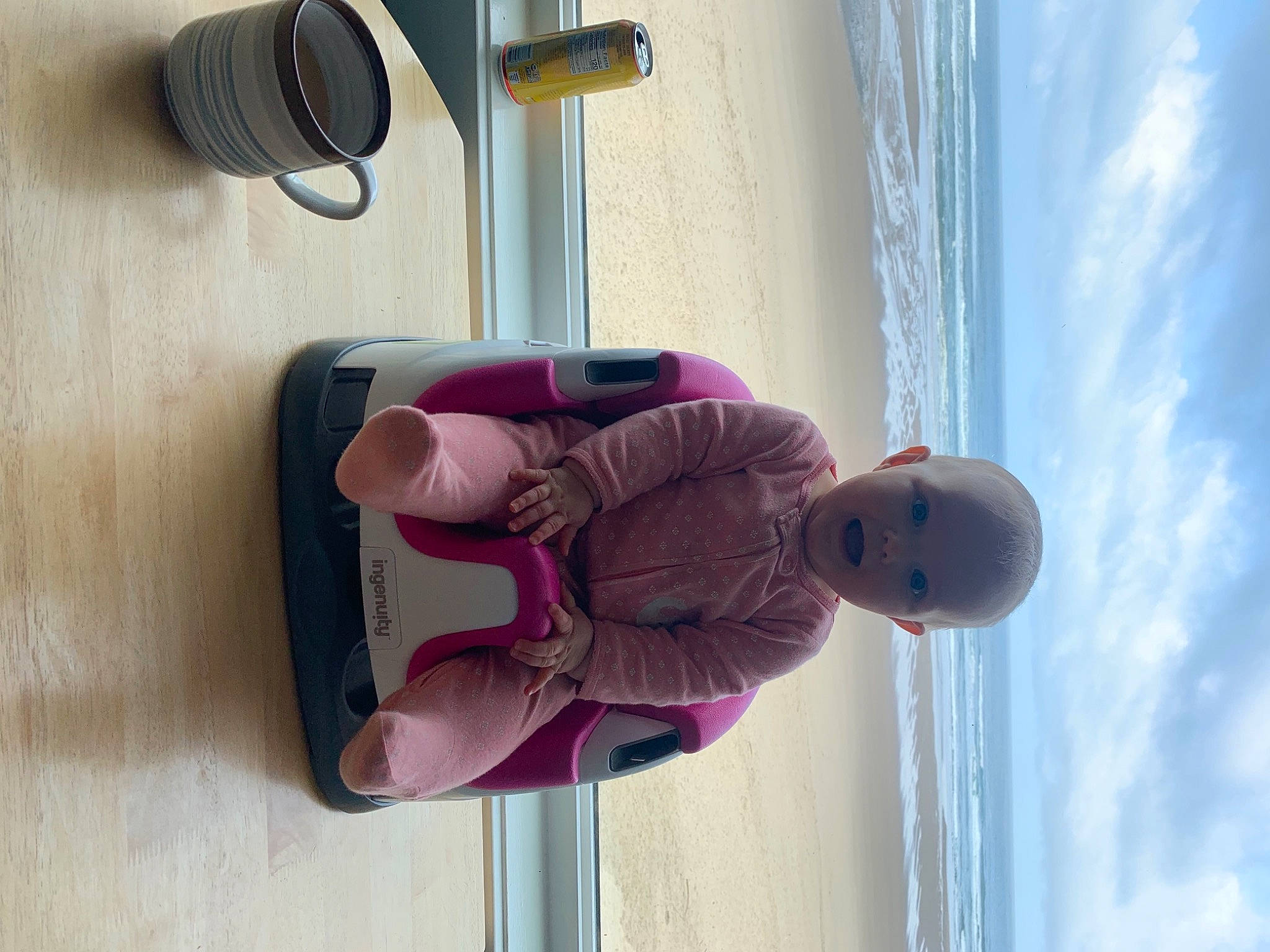 Tatum joined the competition — help win amazing prizes! arm, audio_equipment, baby, baby_toddler_clothing, blue, cloud, hat, light, line, magenta, material_property, output_device, person, product, purple, sky, toddler, violet, water, white