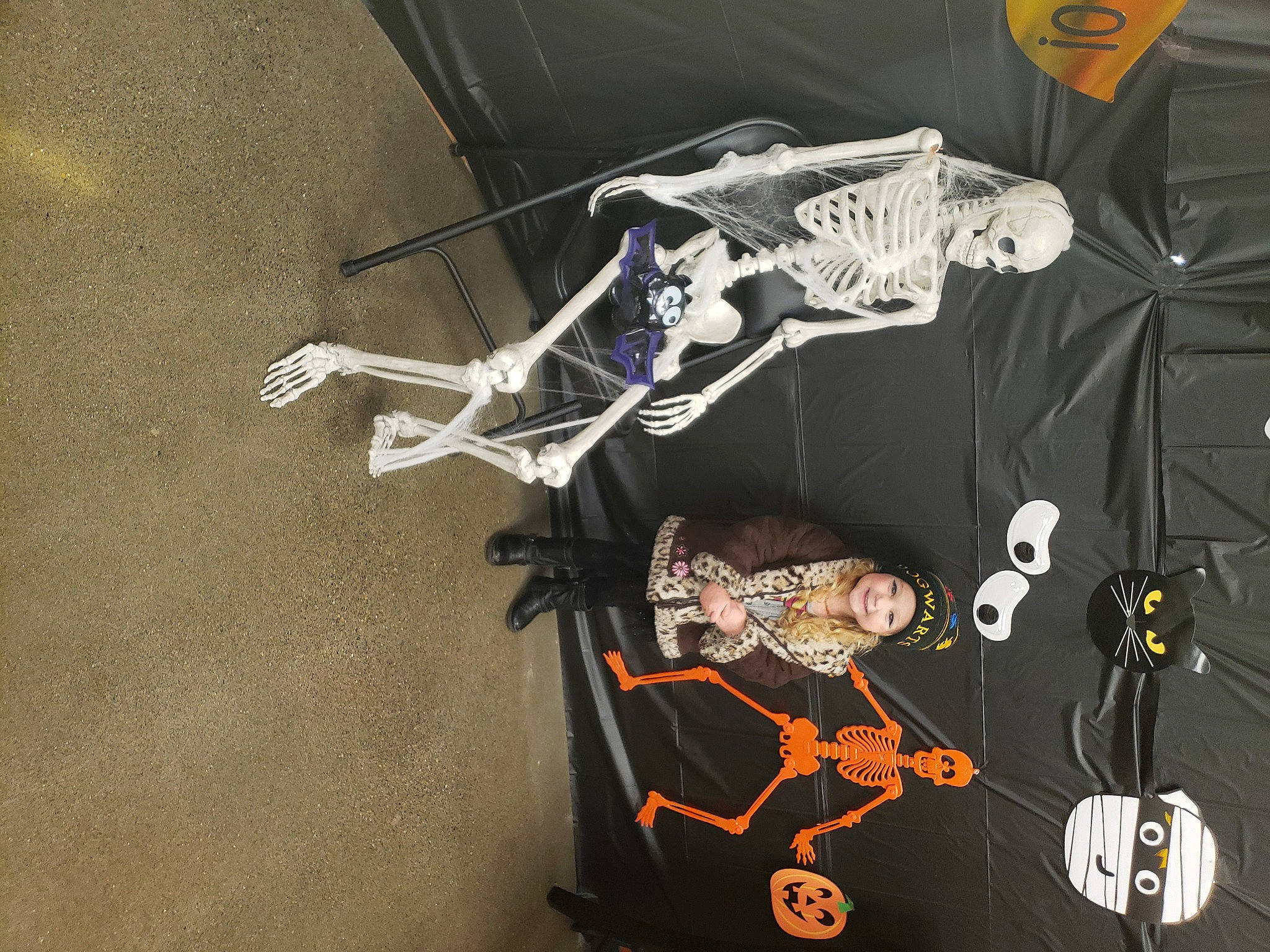 Aria is registered to the contest to win money with this photo: action_figure, animation, art, auto_part, automotive_design, bat, carmine, fashion_accessory, fiction, fictional_character, font, graphic_design, graphics, headwear, illustration, joy, logo, person, sleeve, space