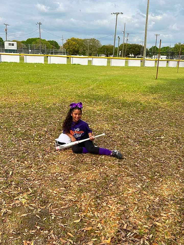 Amyia is registered to the contest to win money with this photo: ecoregion, field, fun, grass, grass_family, grassland, happy, hat, helmet, joy, landscape, lawn, leisure, meadow, people_in_nature, person, plain, plant, recreation, sky