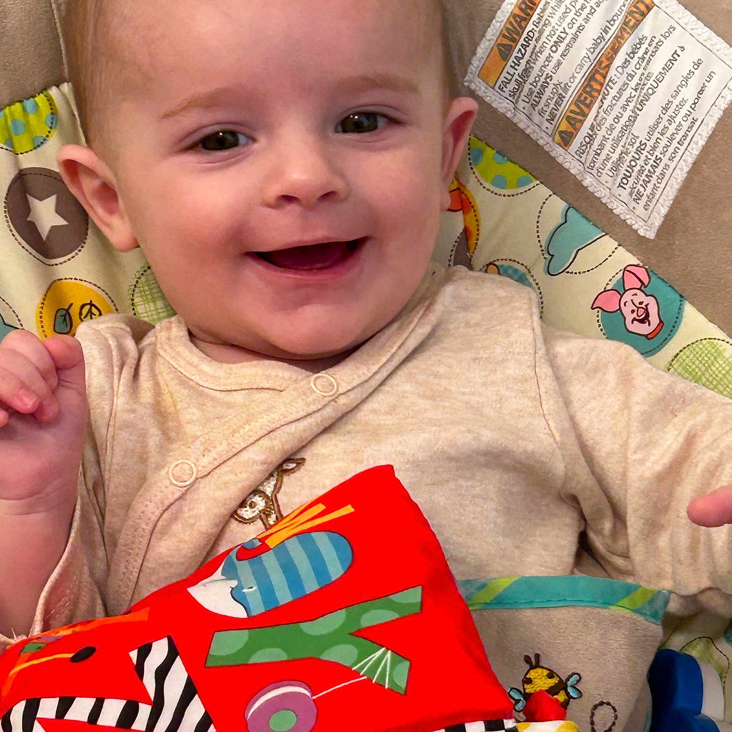 Carson is registered to the contest to win money with this photo: accessories, baby, bag, clothing, couch, cushion, face, furniture, handbag, happy, head, homedecor, laughing, person, photography, pillow, portrait, purse, smile, t_shirt