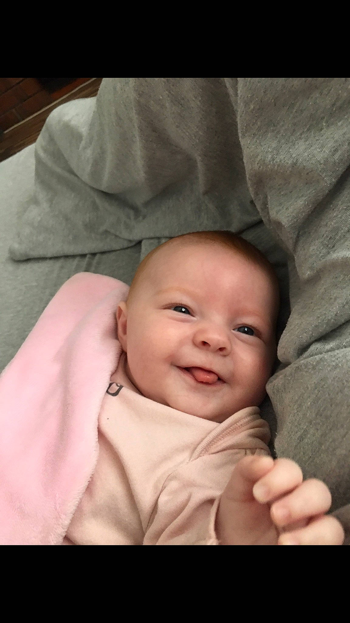 Darcie is registered to the contest to win money with this photo: baby, beauty, cheek, child, chin, eye, face, facial_expression, finger, forehead, gesture, hand, head, joy, lip, mouth, nose, person, photography, skin