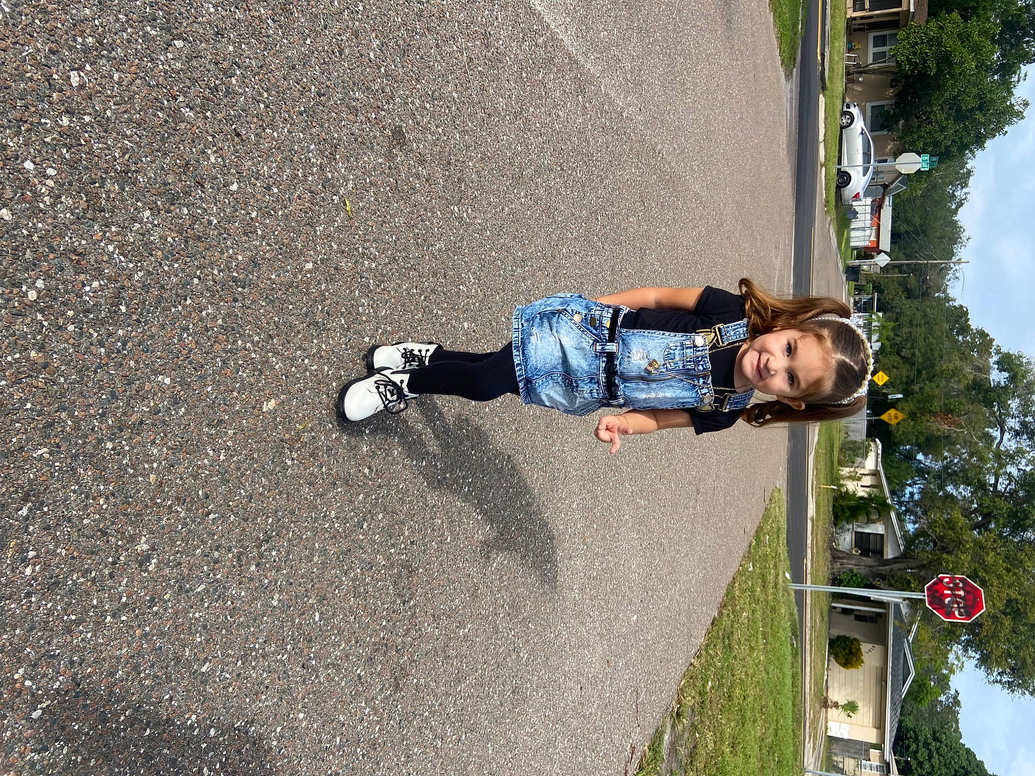 Estrella joined the competition — help win amazing prizes! asphalt, concrete, denim, electric_blue, fun, joy, leisure, person, plant, recreation, road, road_surface, rolling, shadow, sidewalk, sky, soil, street_light, tar, toddler