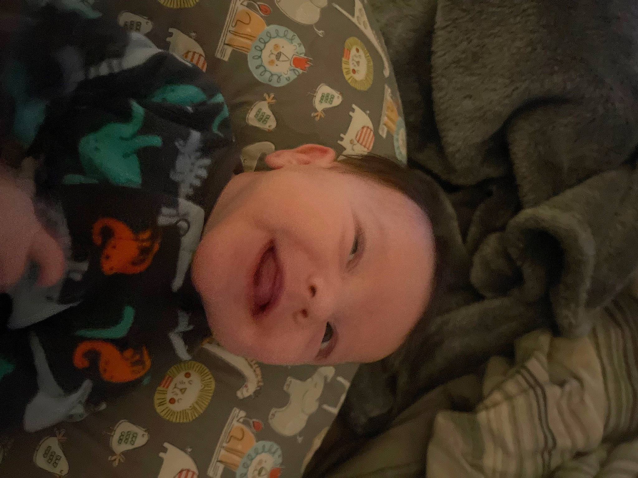 Atreus is registered to the contest to win money with this photo: baby, baby_toddler_clothing, bedtime, brown, cheek, child, comfort, eyebrow, fun, iris, linens, nose, pattern, person, room, skin, sleeve, smile, toddler, wood