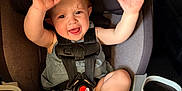 Ellieanna joined the competition — help win amazing prizes! toddler, car_seat, child, pink_shoes, smiling, hands_up, hair_clip, seat_belt, vehicle_interior, cute, happy, safety, infant, casual_clothing, playful, baby, car, seat, footwear, expression